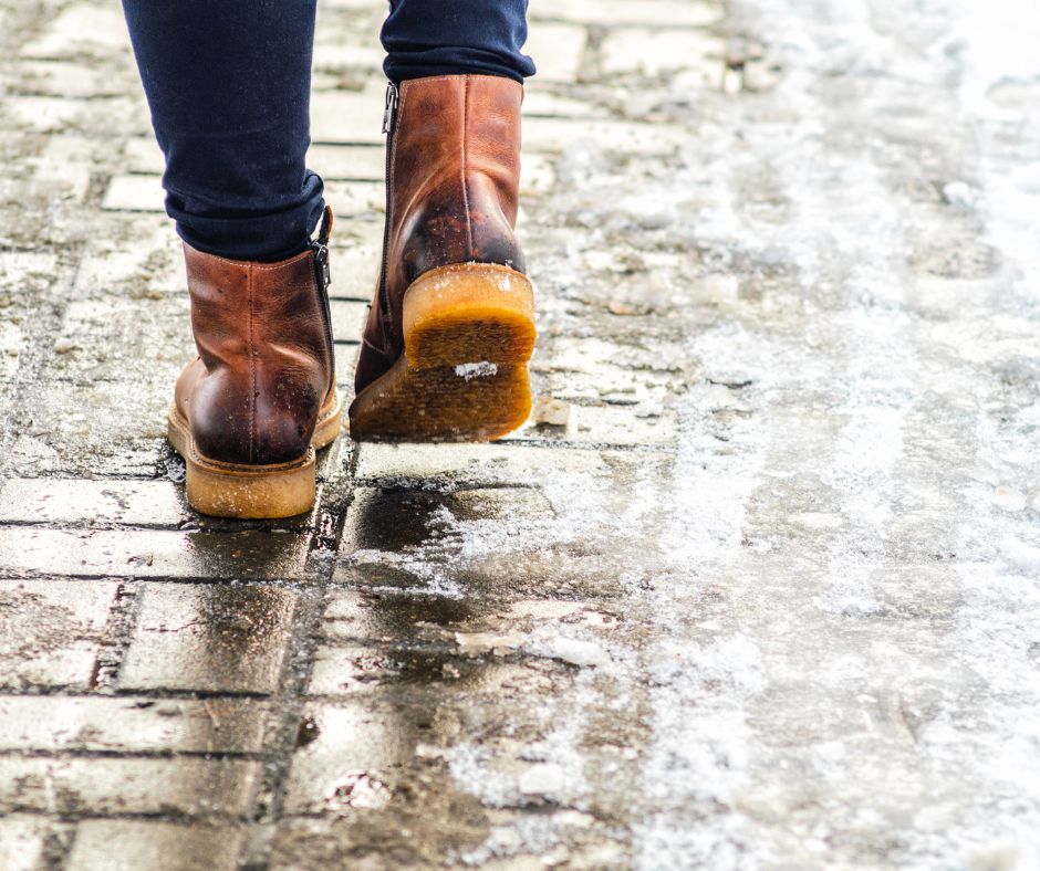 Walk on wet melted ice pavement