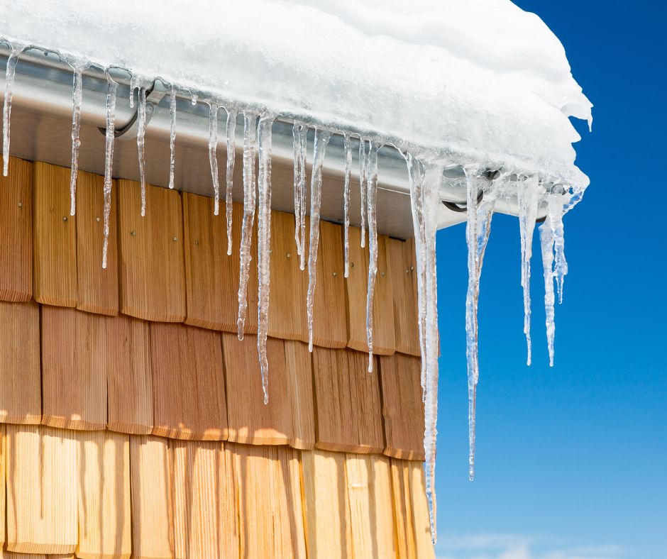 large icicles on the roof